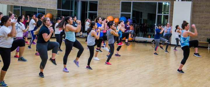 A group of people participating in a fitness class at the SSU Recreation Center