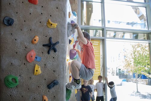 A child rock climbing 