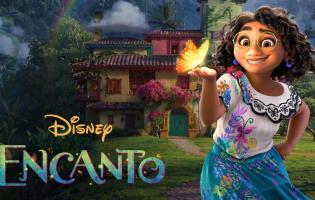 The film poster for 'Encanto' featuring an animated character smiling while holding a butterfly