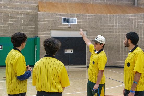A group of referees stand together