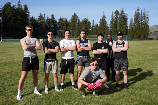 Team of flag footballers pose together