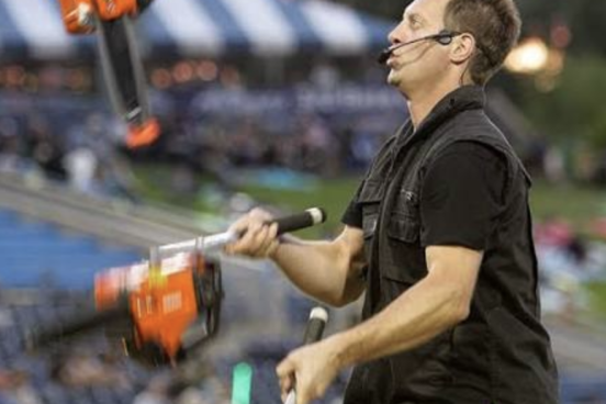 Mad Chad juggling chainsaws