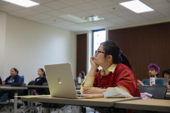 Student listens to lecture intently