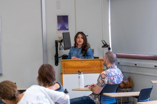 Speaker discusses with an audience