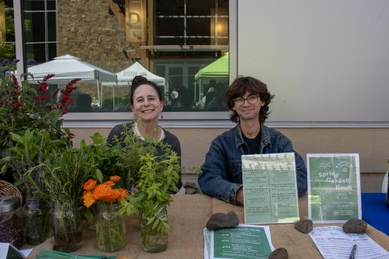 Two representatives of the garden club pose at their table