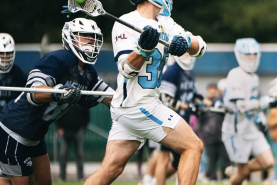Lacrosse player is about to launch the ball