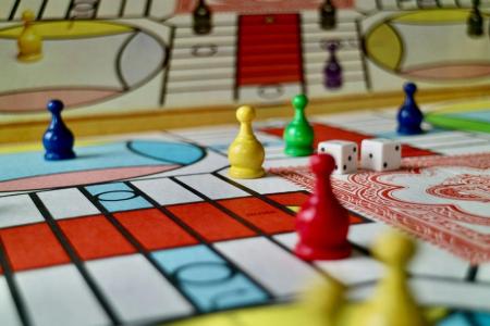 A board game and board game pieces