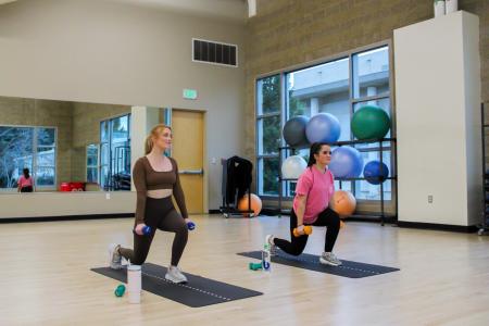 Students lifting weights in the SSU Recreation Center