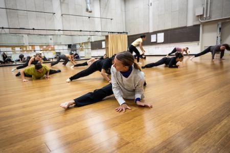 Students Stretching in Dance Studio