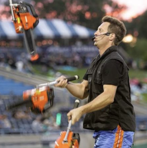 Mad Chad juggling chainsaws