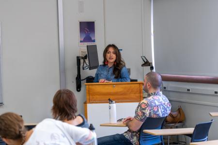 Speaker discusses with an audience