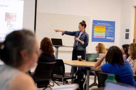 Teacher instructing a room