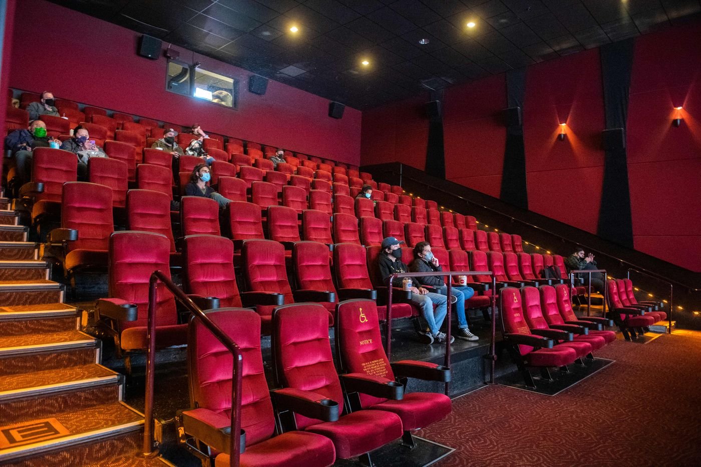 People sitting in a movie theater