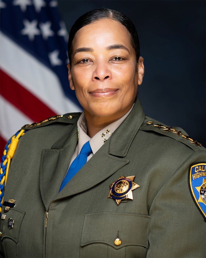 Portrait of Amanda Ray smiling while in uniform