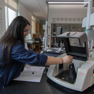 Student working in a biology lab 