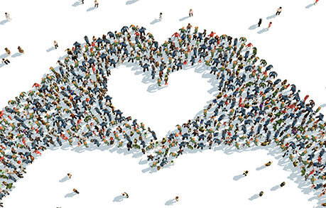 An aerial graphic of a crowd of people forming together to create the shape of two hands put together to form a heart