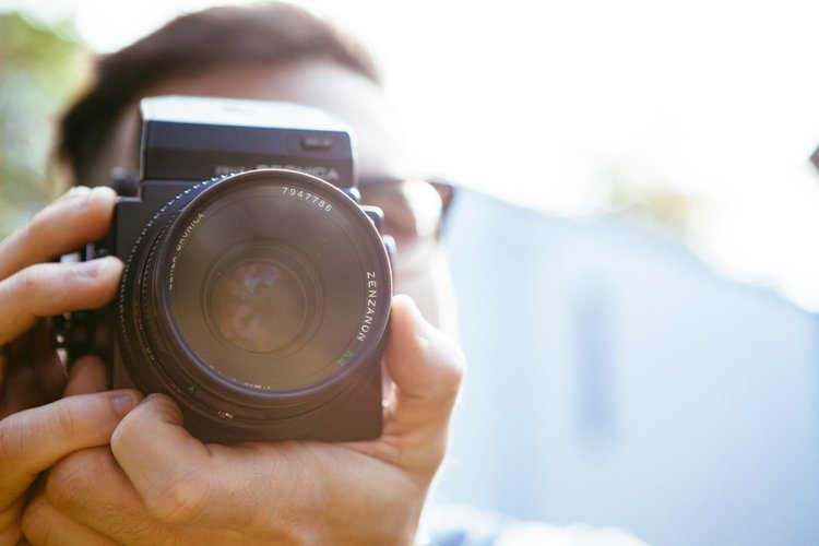 Person holding a camera