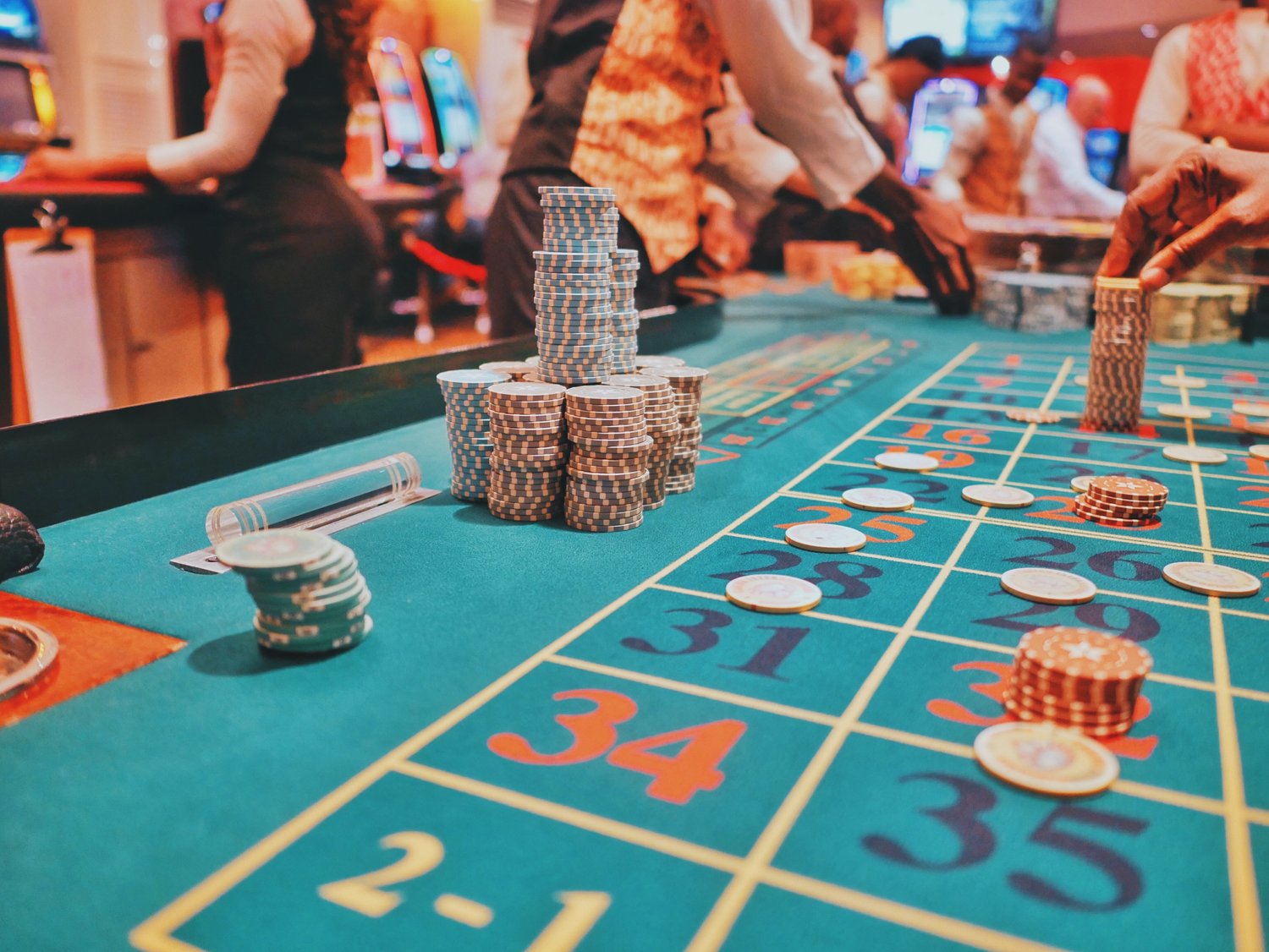 Poker chips on a poker table in a casino 