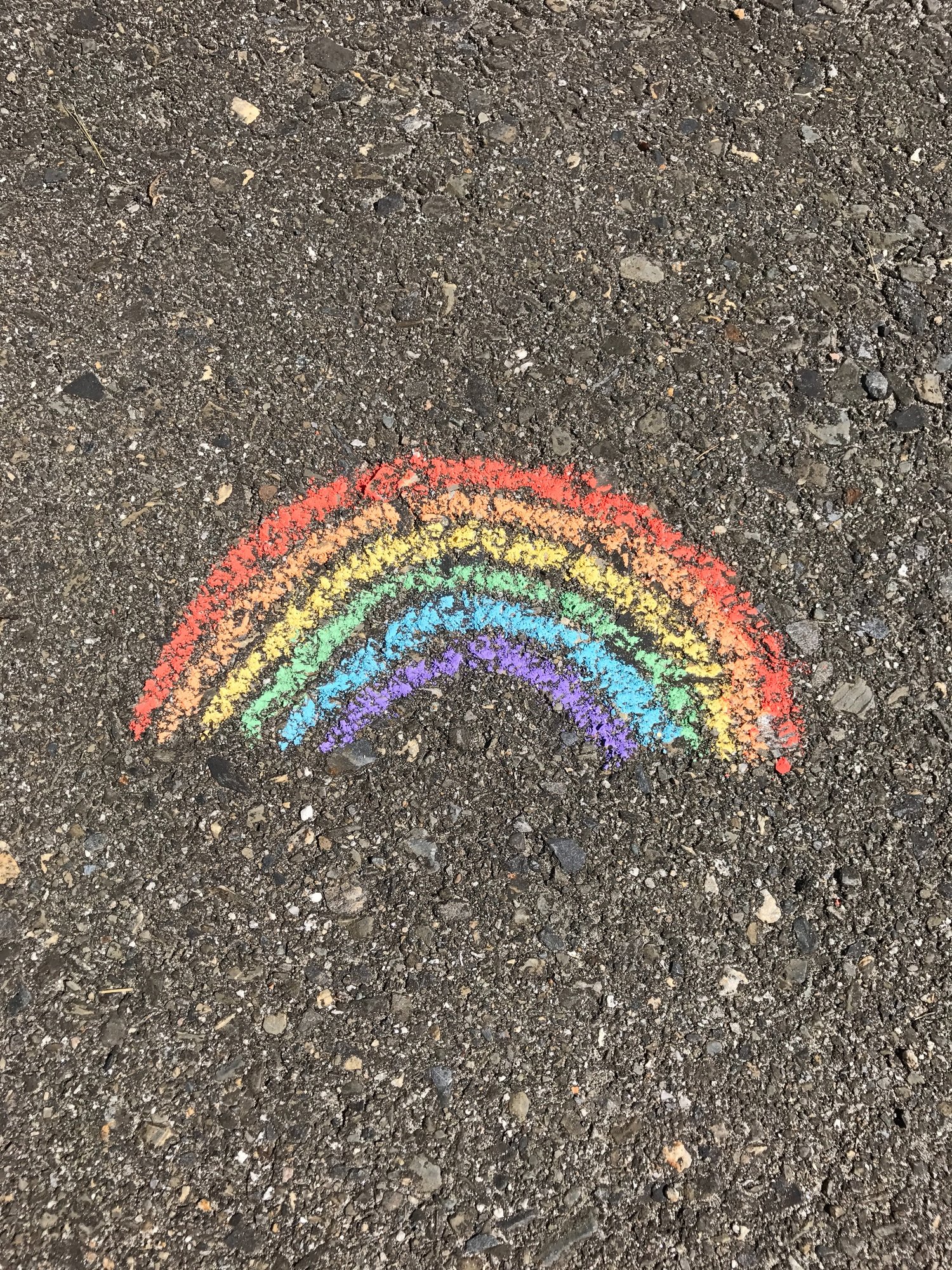 a rainbow drawn in chalk