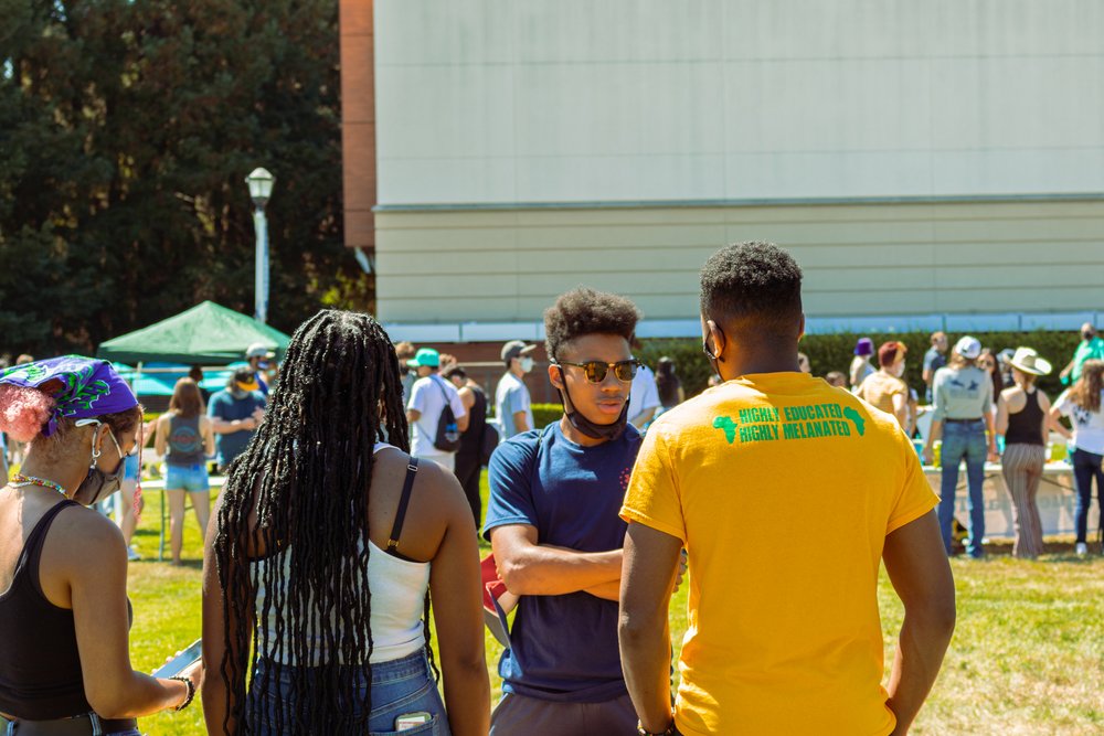 Sonoma State students talking on Person Lawn