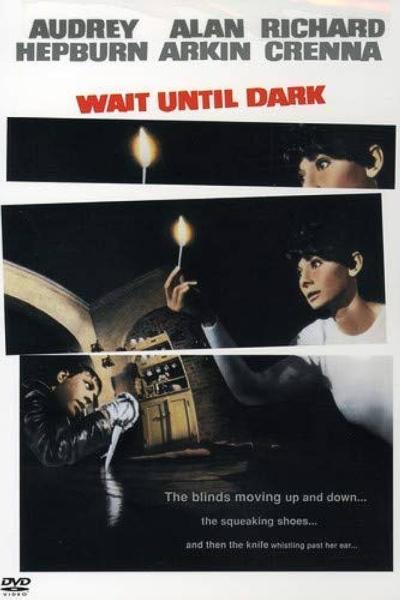 Film poster for 'Wait Until Dark' featuring someone holding a lit match