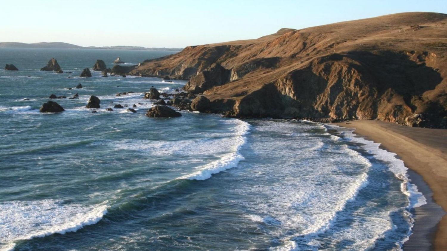 Waves crashing on the shoreline of Dillon Beach