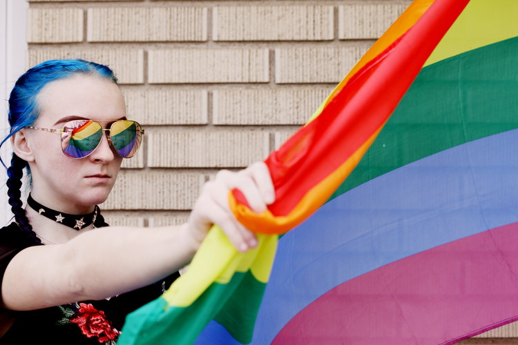 Person holding a flag