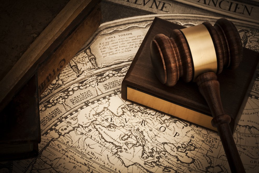 gavel sitting on a map