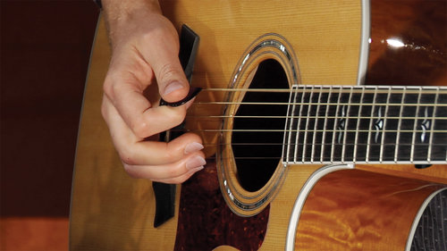 Person playing the guitar