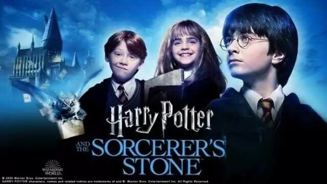 The film poster for 'Harry Potter And The Sorcerer’s Stone' featuring characters Harry Potter, Harmoine Granger, Ron Weasley