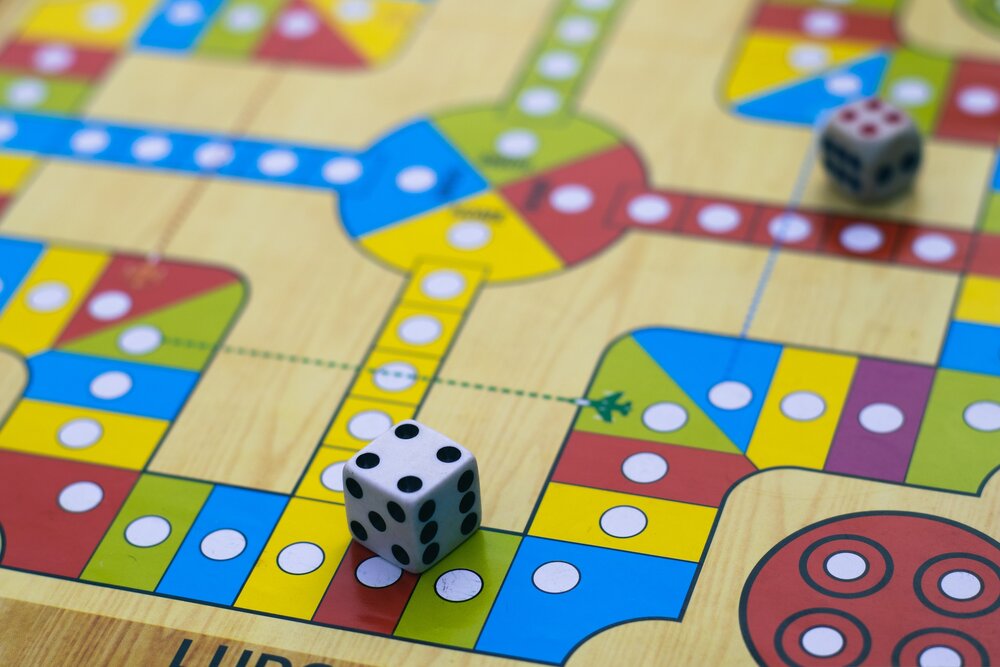 A dice on a board game board