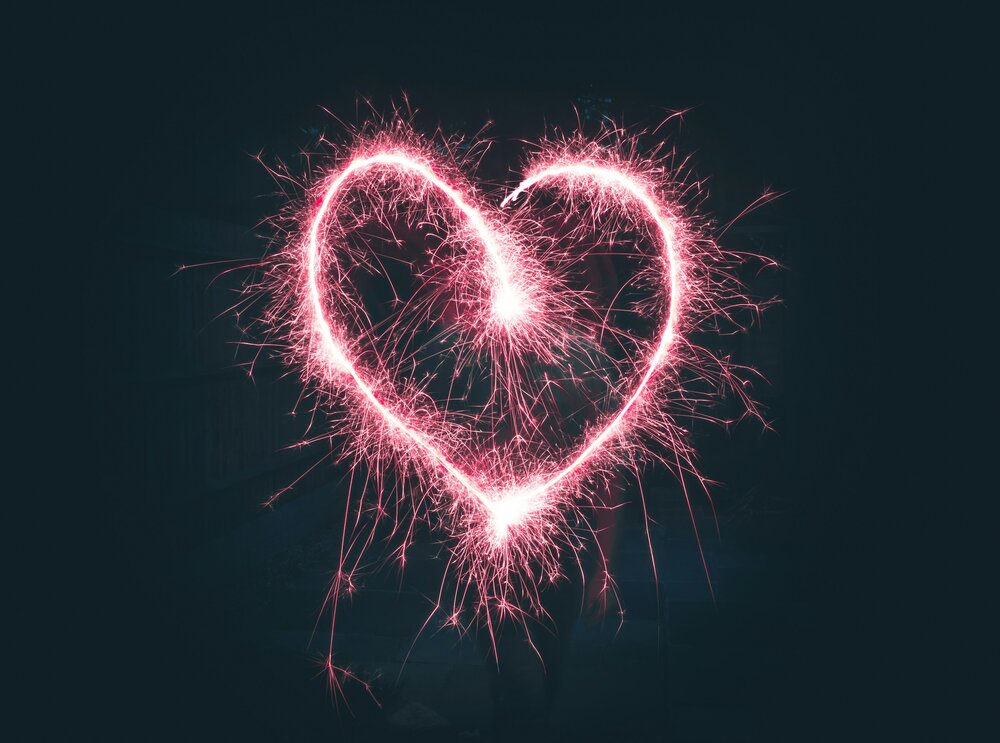 Pink sparks in the shape of a heart