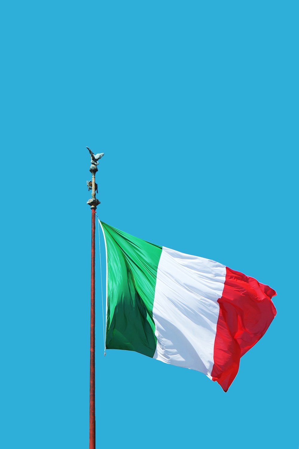 the Italian flag waving in the wind