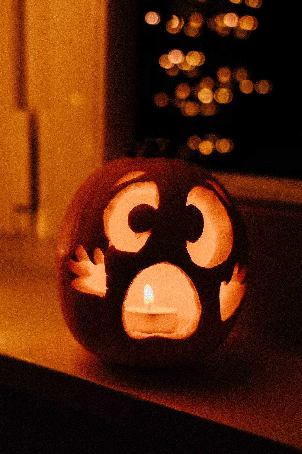 a jack-o'-lantern with a candle in it