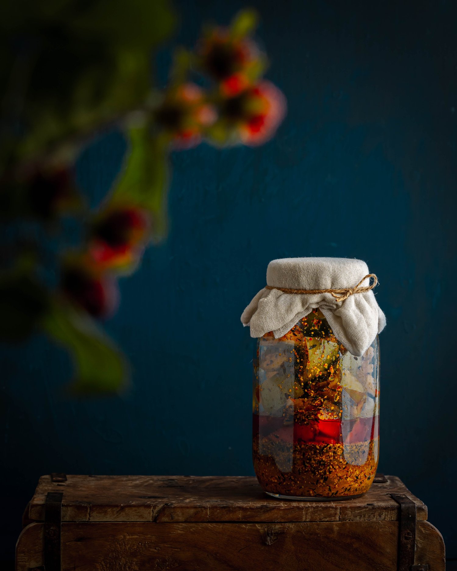 A decorated mason jar of preserved food 