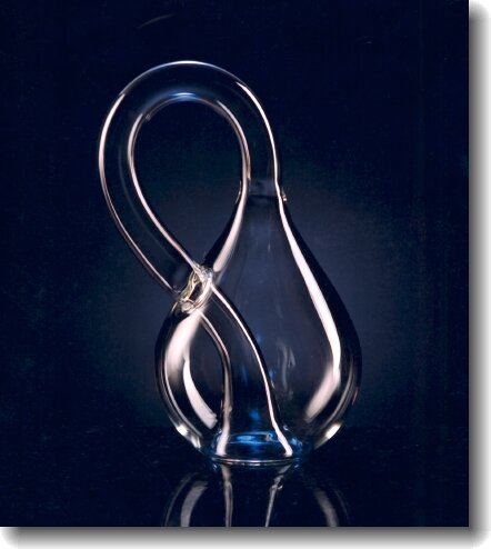 A clear and curvy Klein bottle in front of a black gradient background 