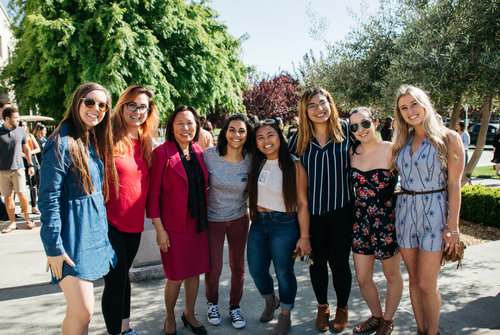 People standing with Judy Sakaki