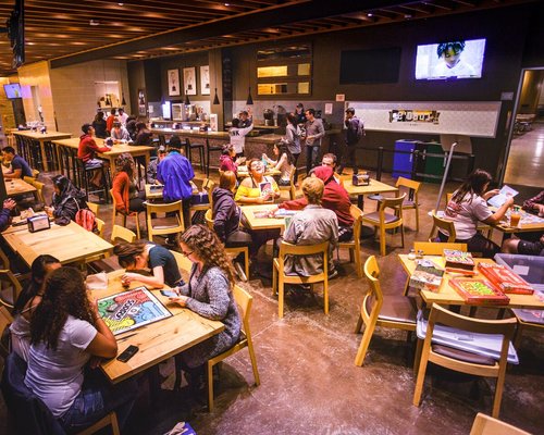 Students playing board games in Lobo's 