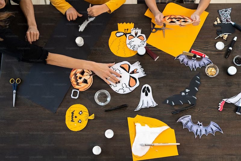 people working on Halloween crafts