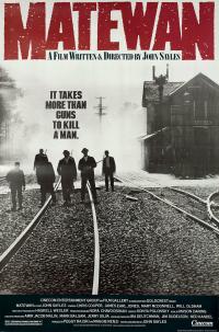 Film poster for 'Matewan' featuring a black and white image of people walking along train tracks