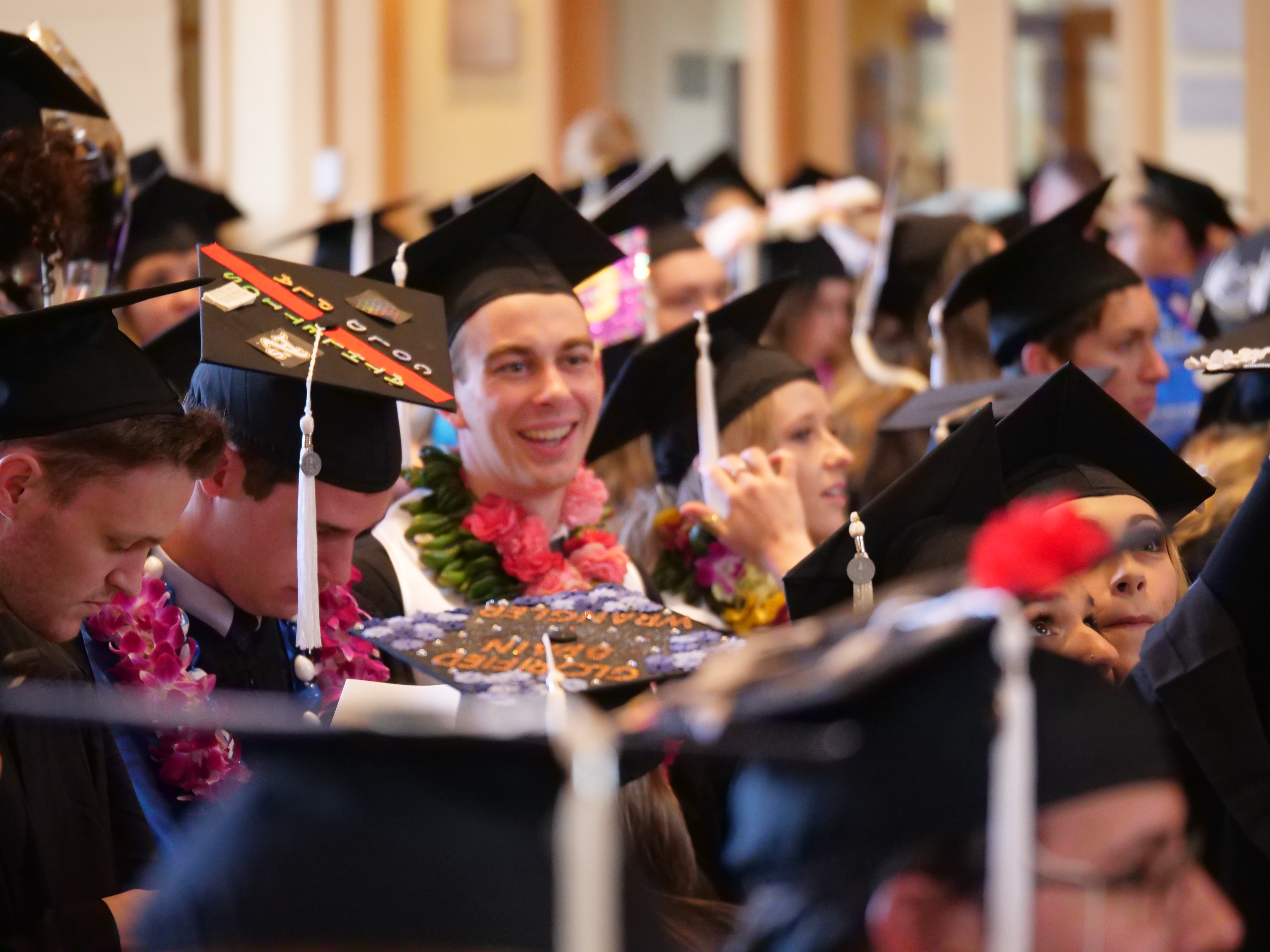 Graduates move tassels 
