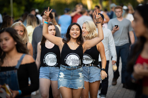 Three sorority members walking