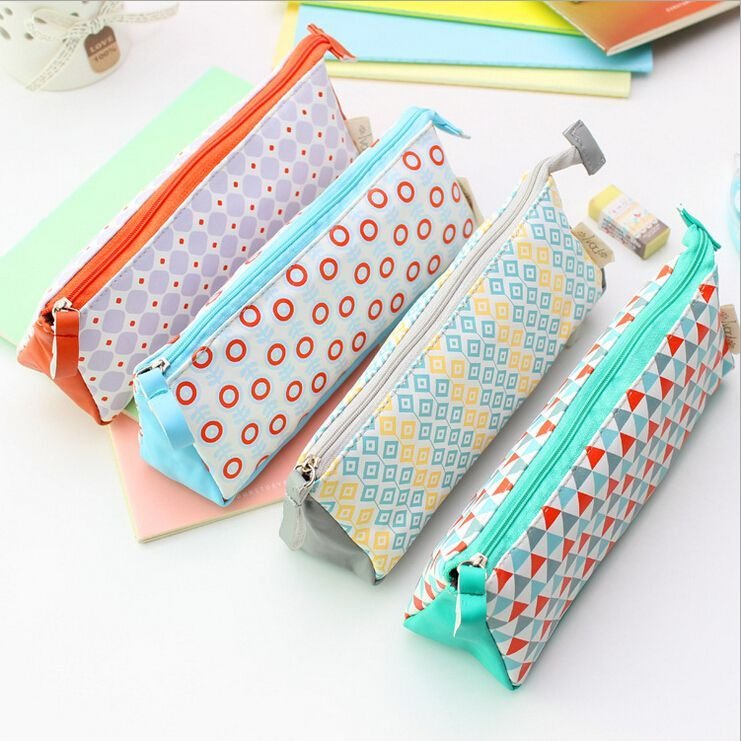 A row of multi-colored pencil cases with varying patterns 