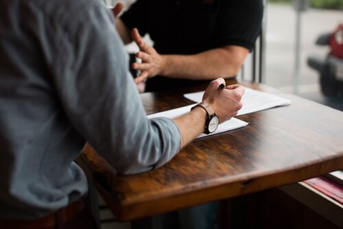 Two people at a table 