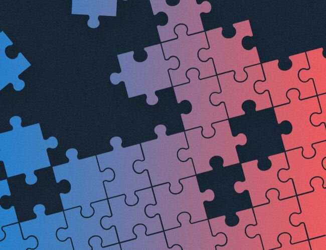 Graphic of blue, purple and pink puzzle pieces