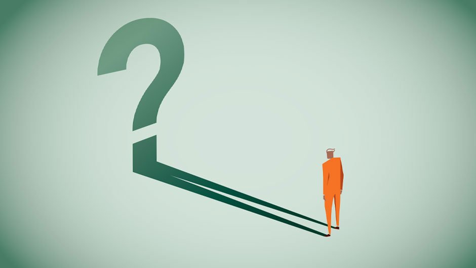 A graphic of a person wearing an orange suit casting the shadow of a question mark 
