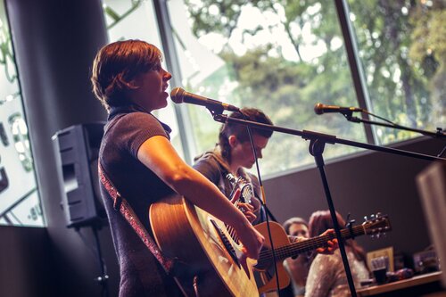 Student playing the guitar 