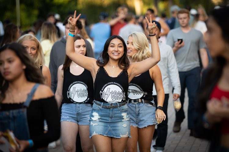 Three sorority members walking 