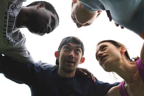 Students in a huddle 