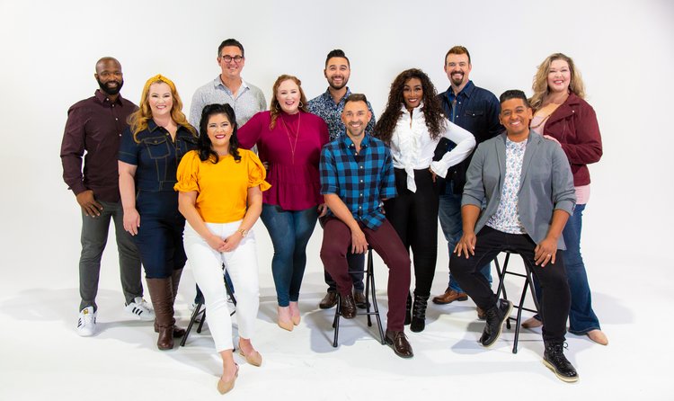 The actors of the 'Voctave' performance smiling and posing together